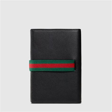 gucci passport holder men's.